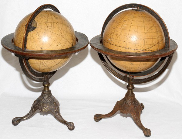 RAND MCNALLY CELESTIAL GLOBES, PAIR, H 17",: RAND MCNALLY CELESTIAL GLOBES, PAIR, H 17", DIA 12":Each on a metal tripod base which ends in claw and ball feet.