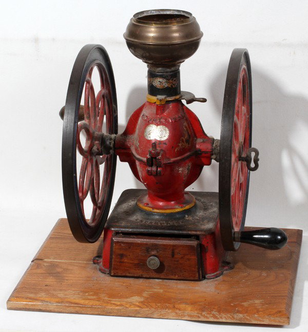 ENTERPRISE PAINTED CASE IRON COFFEE GRINDER, : ENTERPRISE PAINTED CASE IRON COFFEE GRINDER, 1898, 16" X 16":With remnants of red paint. Pat. July 12, 1898.