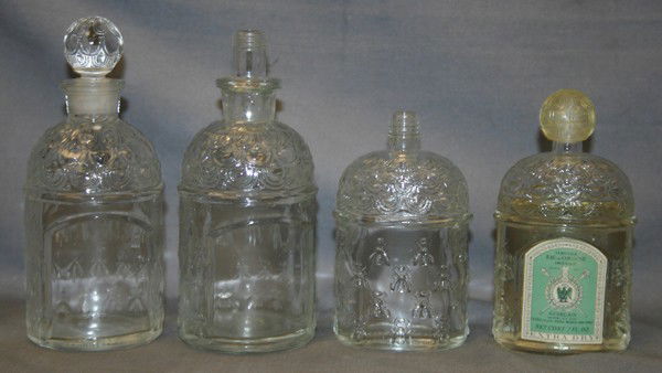 GUERLAIN SCENT BOTTLES, C. 1900, 4 PIECES,: GUERLAIN SCENT BOTTLES, C. 1900, 4 PIECES, H 3" TO 5":Two missing stoppers.