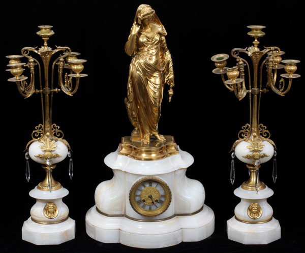 F GAUTIER & J ALBINET DORE 3PC CLOCK GARNITURE: F. GAUTIER & J. ALBINET DORE BRONZE & ONYX 3 PIECE CLOCK GARNITURE, C. 1855-1885, H 28", 24":Lot includes: clock surmounted by a Eugène Louis Lequesne (French, 1815-1887) dore bronze sculpture of a s