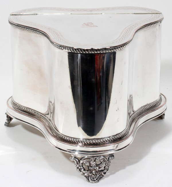 ENGLISH SILVER PLATE BISCUIT BOX, 19TH C, H 7": ENGLISH SILVER PLATE BISCUIT BOX, 19TH CENTURY, H 7", W 9 1/2":Trefoil form with hinged cover and three supports. Stamped on the underside with a crown within a triangular/shield like enclosure.