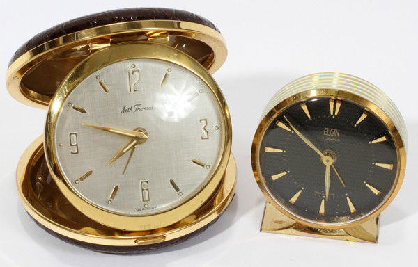 TRAVEL CLOCKS, TWO: SETH THOMAS AND ELGIN: TRAVEL CLOCKS, TWO: SETH THOMAS AND ELGIN:Elgin with leather case pigskin, Seth Thomas with German works.