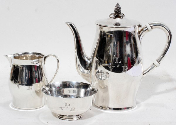TUTTLE STERLING COFFEE POT, CREAMER & : TUTTLE STERLING COFFEE POT, CREAMER & SUGAR BOWL, C. 1955:A Paul Revere Reproduction set including 1 individual coffee pot with pineapple finial, H.6", 1 creamer, and 1 sugar bowl, Dia.3 1/4"; each pi