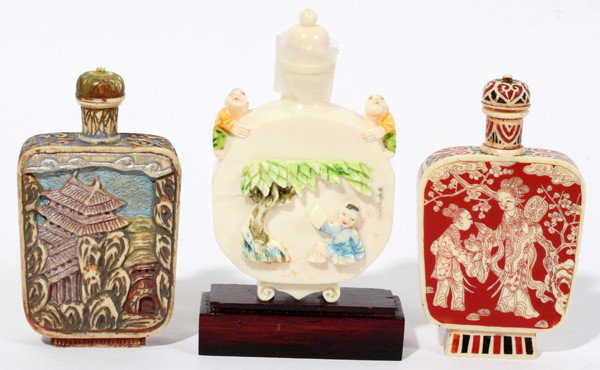CHINESE & JAPANESE IVORY SNUFF BOTTLES, THREE: CHINESE & JAPANESE IVORY SNUFF BOTTLES, THREE, H 2 1/2"-3":Including 1 snuff bottle with screw cap (no spoon), carved and painted featuring figures and architecture, signed at the underside, H.2 5/8";