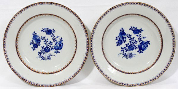 ANTIQUE PORCELAIN SOUP PLATES, PAIR,: ANTIQUE PORCELAIN SOUP PLATES, PAIR, DIA 9 1/4":A matching set of 2 porcelain soup plates, each with a bright blue floral spray at the well, trimmed in gold and blue at the rim and cavetto. Property o