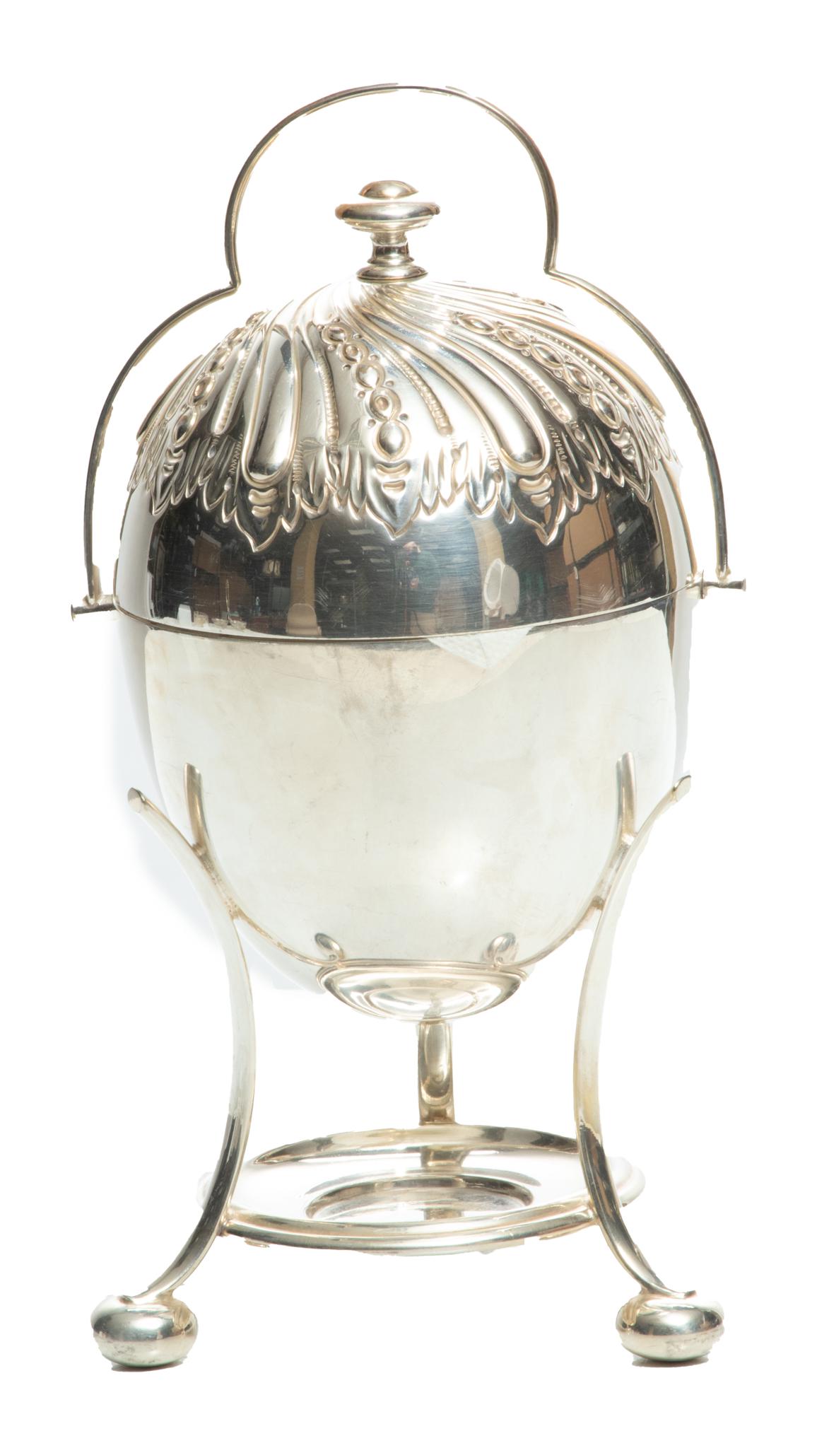 Mappin Bros. Queen's Plate Egg Poacher On Burner H 9.5'' Dia. 4.5'': Mappin Bros. Queen's Plate Egg Poacher On Burner H 9.5'' Dia. 4.5'' | Swing handle. Rack holds eggs over hot water base.Provenance: Property of a Bloomfield Hills, MI private collector.