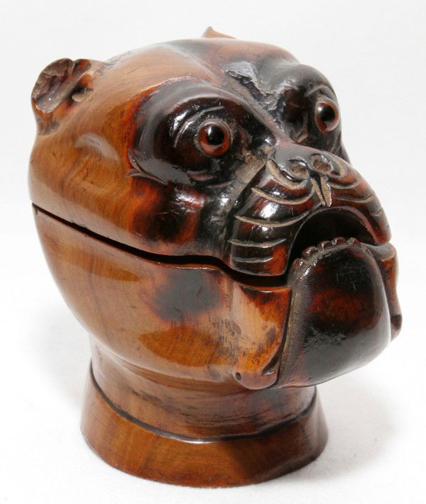 CARVED WOOD INKWELL IN THE FORM OF A BOXER DOG: CARVED WOOD INKWELL IN THE FORM OF A BOXER DOG, C. 1900, H 2 3/4":Glass eyes. From the Estate of Robert and Elizabeth Mandy, Bingham Farms, Mi.