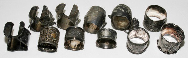 AMERICAN VICTORIAN SILVERPLATE NAPKIN RINGS: AMERICAN VICTORIAN SILVERPLATE NAPKIN RINGS, ELEVEN:A variety of makers and engraved inscriptions.