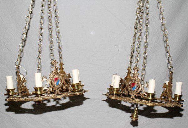 CAST IRON SIX-LIGHT CHANDELIERS, C. 1927, PAIR,: CAST IRON SIX-LIGHT CHANDELIERS, C. 1927, PAIR, H 30" OVERALL, DIA 20":From a Palmer Woods home, Detroit, Michigan; each features a crown above a shield flanked by crowned griffins, manufacturer's nam