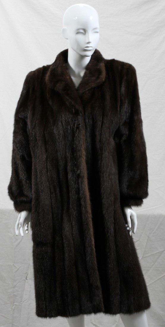 WRUBEL & KOZIN MINK COAT, L 44": WRUBEL & KOZIN MINK COAT, L 44":Having a closure consisting of 3 hooks and eyes; with previous owner's name sewn into the lining.
