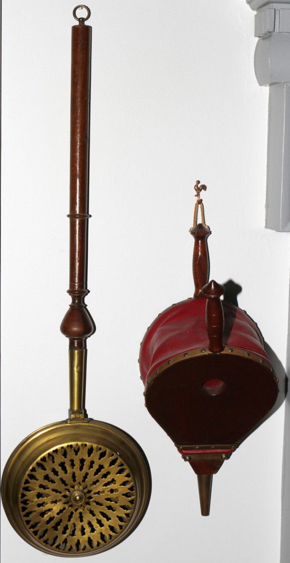 BRASS & WOOD CHESTNUT BASKET, L 35" & BELLOWS: BRASS & WOOD CHESTNUT BASKET, L 35" & BELLOWS, 18":The chestnut roasting basket has a turned wood handle and pierced brass cover together with wood and leather bellows. From the Estate of Robert and E