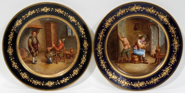 SEVRES PORCELAIN PLATES, SCENES AFTER TENIERS: SEVRES PORCELAIN PLATES, SCENES AFTER TENIERS, PAIR, DIA 9 1/2":Genre scenes after David Teniers in cavetto. Cobalt border with raised fired gold detail. Interlaced "L"s in blue over glaze paint on re