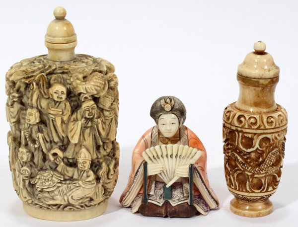 CHINESE CARVED IVORY SNUFF BOTTLES & NETSUKE,: CHINESE CARVED IVORY SNUFF BOTTLES & A JAPANESE NETSUKE, THREE PIECES, H 2" - 3 1/2":Including 1 large carved ivory snuff bottle depicting numerous figures in various pursuits, 1 smaller ivory snuff b