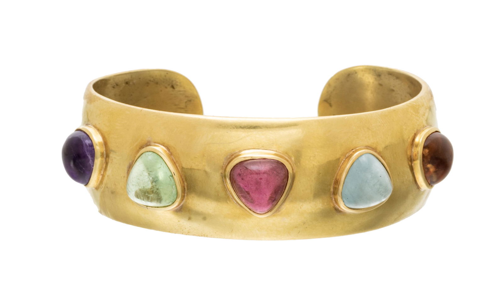 18kp Yellow Gold And Cabochon Cuff Bracelet, 53g: 18kp Yellow Gold And Cabochon Cuff Bracelet, 53g | Marked "18kp" on interior of cuff. Weight taken including stones. Peridot, sapphire, aquamarine, topaz. Provenance: Property of a Grosse Pointe Park,