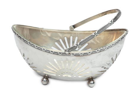 Roger Williams Sterling Silver Crystal Lined Basket, Bail Handle H 5'' L 5.7'' 3.6t oz: Roger Williams Sterling Silver Crystal Lined Basket, Bail Handle H 5'' L 5.7'' 3.6t oz | Maker WR Roger Williams, Rhode Island. Ball form feet. D263. Provenance: Property from the estate of a distingu