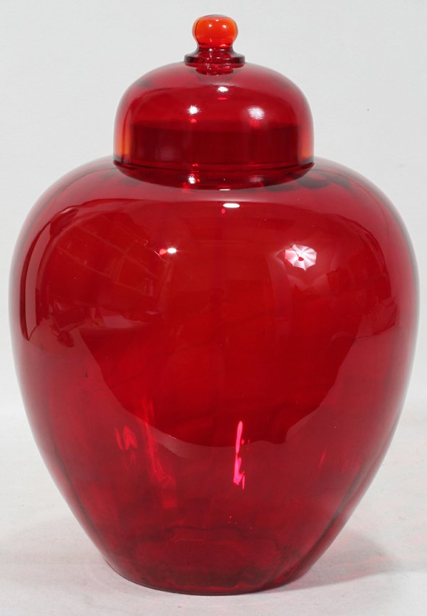 RUBY GLASS COVERED GINGER JAR 11": RUBY GLASS COVERED GINGER JAR, H 11", DIA 8":No apparent markings.