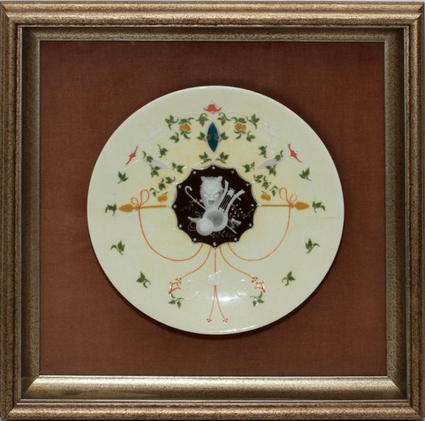 MINTONS PATE-SUR-PATE PORCELAIN PLATE: MINTONS PATE-SUR-PATE PORCELAIN PLATE, LATE 19TH C., DIA 9", FRAMED:A cream glazed plate with scalloped reserve at the center enclosing the attributes of various Muses in white slip on a brown ground,