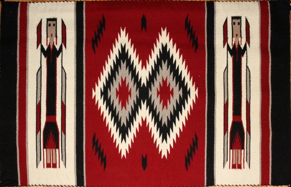 NAVAJOYEI RUG, 44" X 30": NAVAJO YEI RUG, 44" X 30":Two figures. White, Black and red. From the collection of Dr. Robert Walkowiak, Canton, Mi.