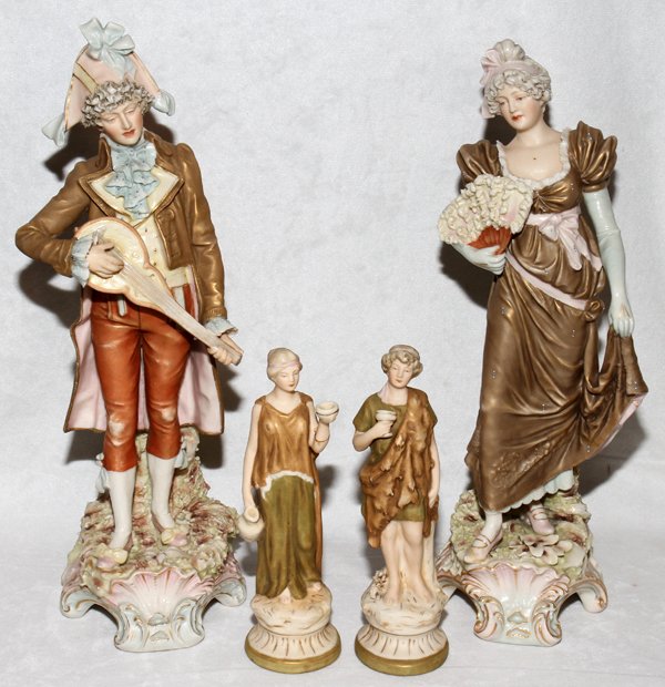 ROYAL DUX PORCELAIN FIGURES EARLY 20TH C.: ROYAL DUX PORCELAIN FIGURES, EARLY 20TH C., TWO PAIRS, H 14" & 7":Including a late 18th century style gentleman and lady, he holds a mandolin and she a fan, numbered 374 and 375, respectively; togethe