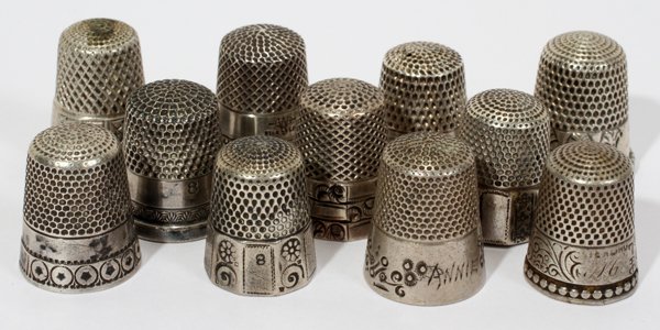 AMER. & CONTINENTAL STERLING & SILVER THIMBLES: AMERICAN & CONTINENTAL STERLING & SILVER THIMBLES, ANTIQUE, TWELVE:Thimbles marked sterling include such makers as Webster Co., Waite, Thresher & Co. and Ketchem McDougall, totaling approximately 0.61
