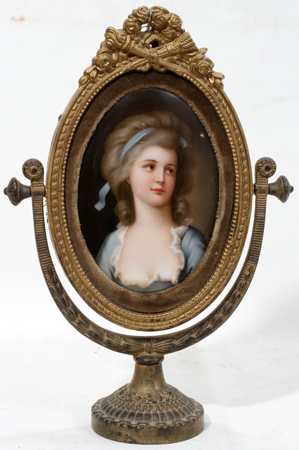 HAND PAINTED OVAL PORCELAIN PLAQUE IN FRAME: HAND PAINTED OVAL PORCELAIN PLAQUE IN CHEVAL STYLE BRONZE FRAME, 11 1/2" X 8" FRAMED:Portrait of Beatrice plaque, 7" x 5" is unsigned on recto (front); bronze frame having laurel leaf, gadroon and flo