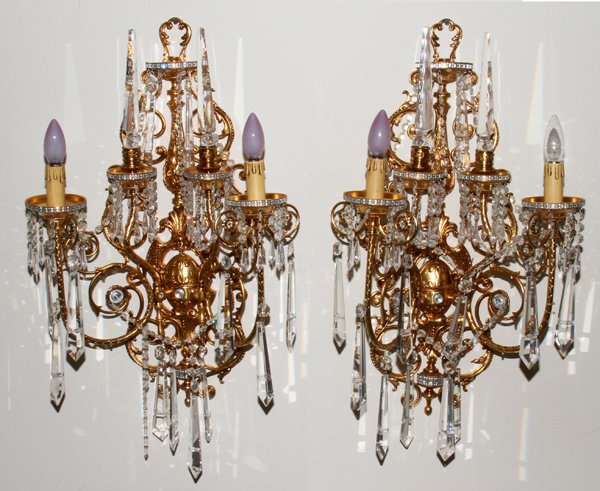 BRONZE & CRYSTAL WALL SCONCES, PAIR 27": BRONZE & CRYSTAL WALL SCONCES, PAIR, H 27", W 30", D 8":Scrolling throughout with flowers and crystal prisms.