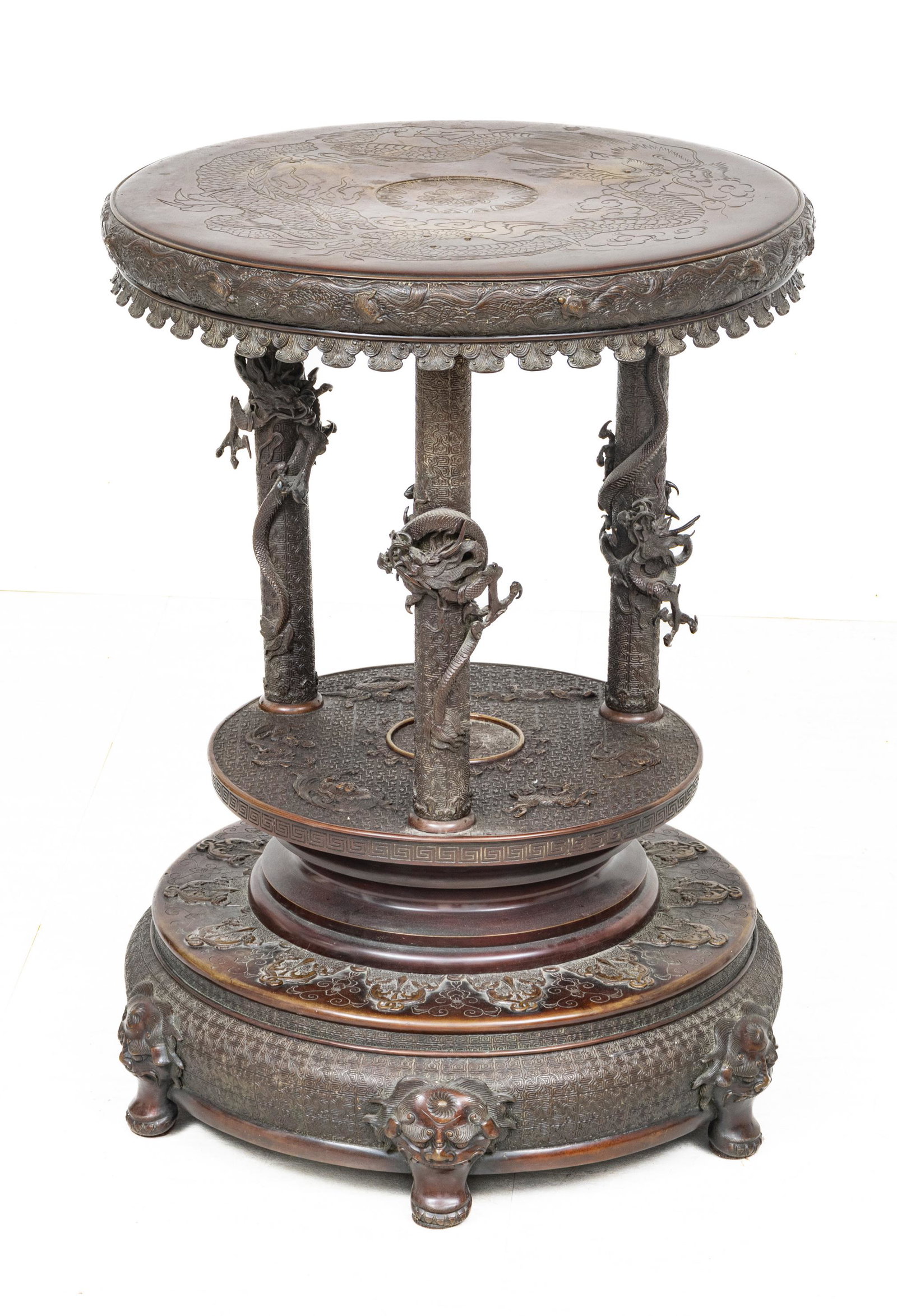 Japanese Meiji Period Bronze Table H 29.75'' Dia. 21'': Japanese Meiji Period Bronze Table H 29.75'' Dia. 21'' | High relief dragon designs.