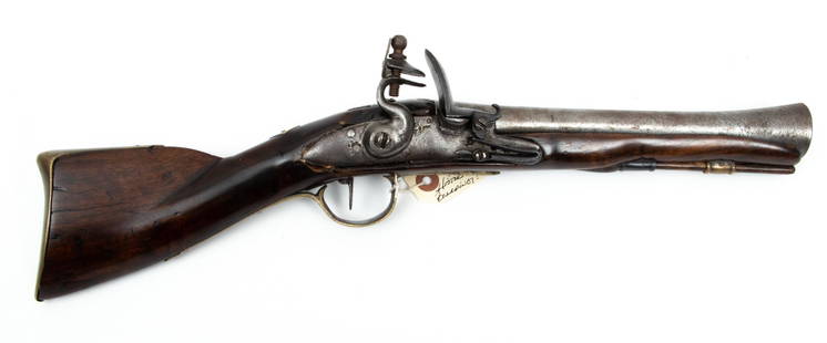 European Flintlock Knee Blunderbuss, Early 19th C., L 18'': European Flintlock Knee Blunderbuss, Early 19th C., L 18'' | 'Dragon' or knee flintlock blunderbuss having an 8.75" trumpet barrel. No visible proof marks. Carved wood stock with brass trigger guard a