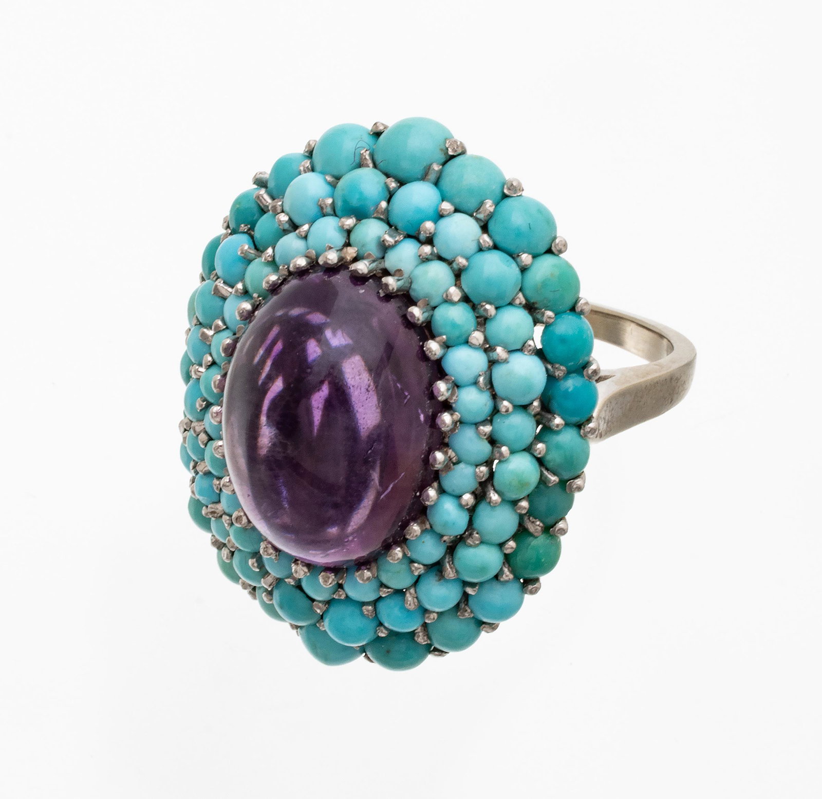 Turquoise And Cabochon Amethyst Ring, Size 7 1/4 L 2.3" 14.4g: Turquoise And Cabochon Amethyst Ring, Size 7 1/4 L 2.3" 14.4g | Three rows of turquoise beads. White gold not marked. Provenance: From the Estate of Prominent Collector, Leon Zielinski, Macomb County,