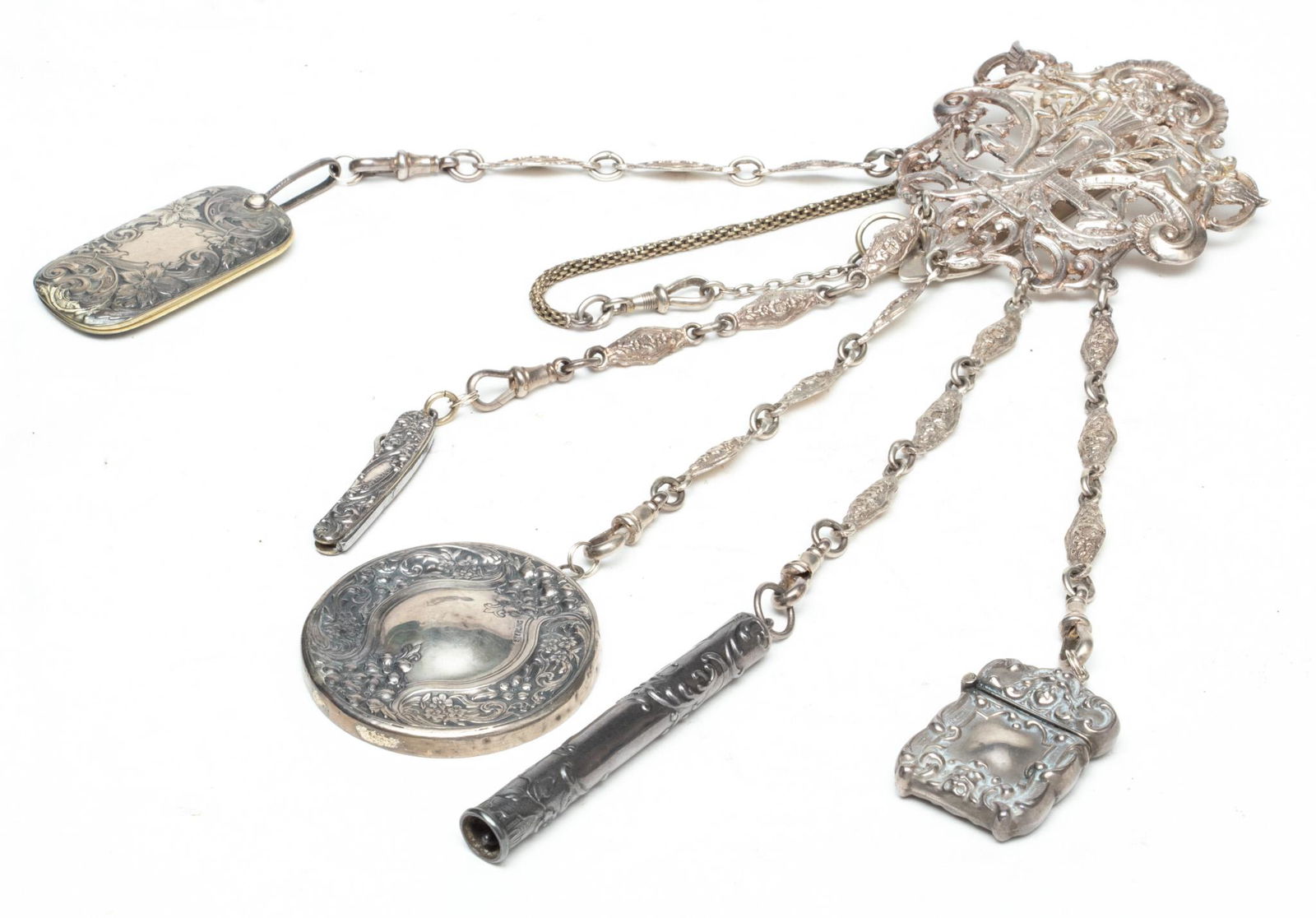 Sterling Silver Chatelaine, L 9.62": Sterling Silver Chatelaine, L 9.62" | Having hallmarks on the hook and integrated into front design. With crest design depicting scrolling leaf and trumpets, with angels playing trumpets. Having 5 cha