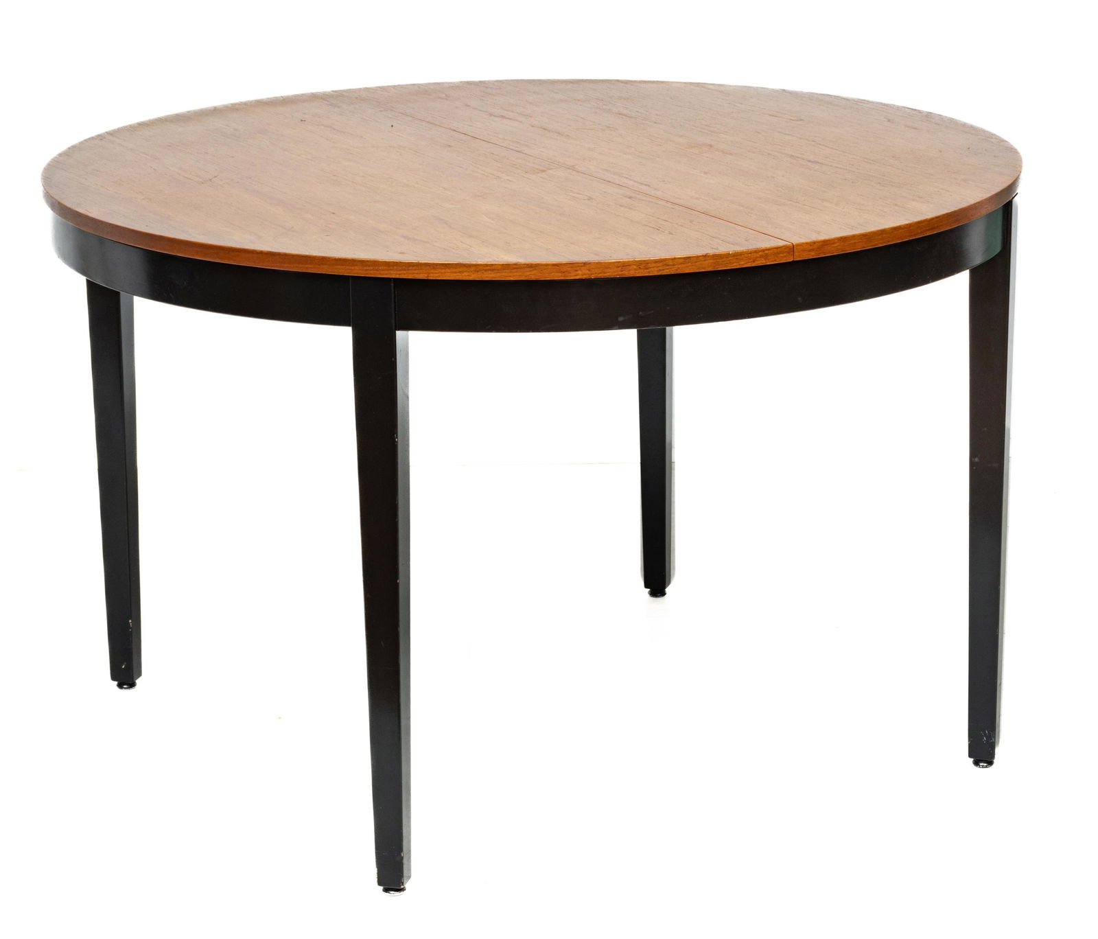 George Nelson For Herman Miller (American) Dining Table, H 29" Dia. 47.5": George Nelson For Herman Miller (American) Dining Table, H 29" Dia. 47.5" | Having a black frame with teak top. One 24" table leaf.