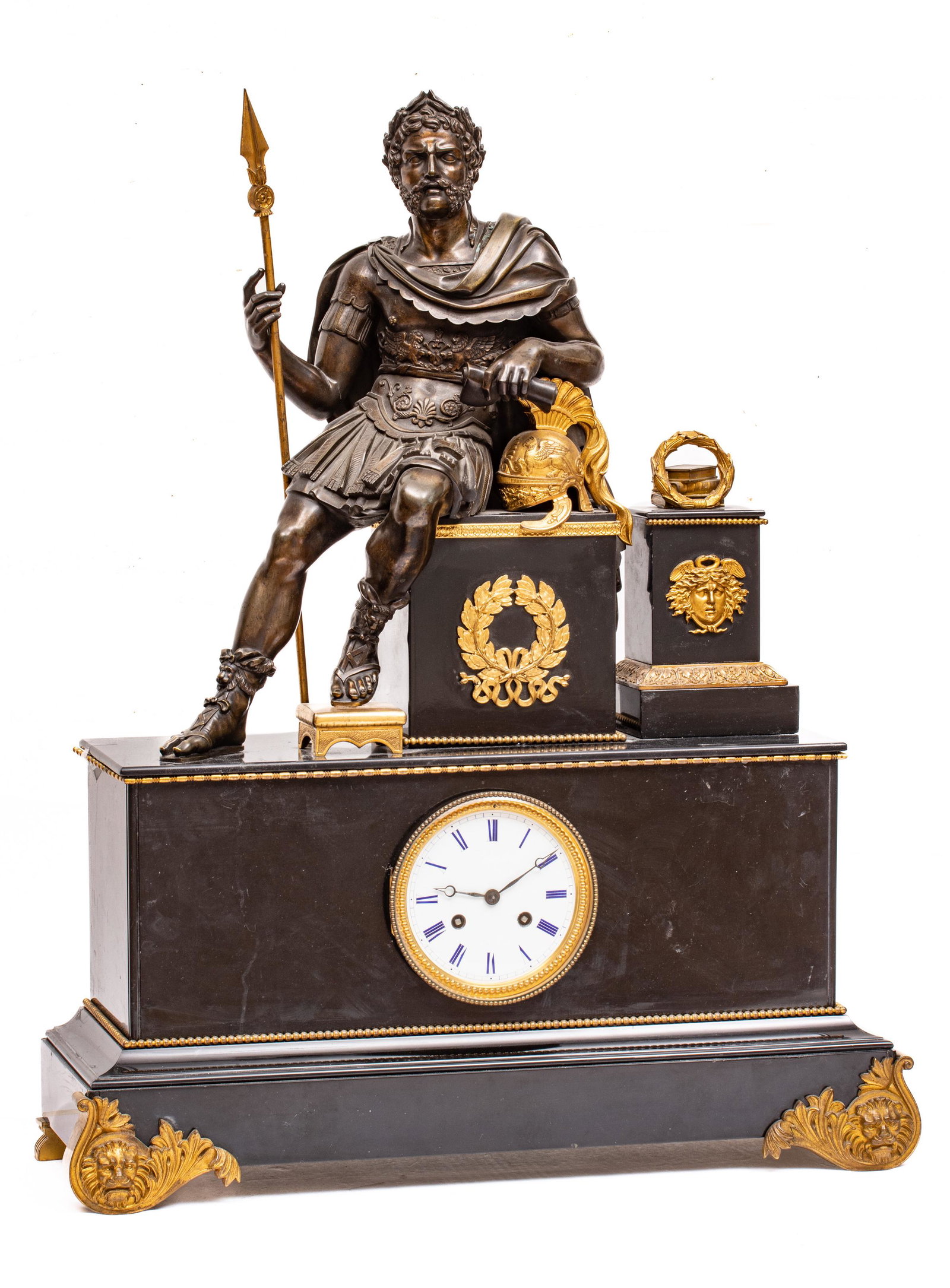 French Empire Bronze Figural Mantel Clock, Vincenti & Cie, 19th C., Seated Roman General, H 30" W: French Empire Bronze Figural Mantel Clock, Vincenti & Cie, 19th C., Seated Roman General, H 30" W 23" L 8.5" | Having a bronze seated Roman general with laurel leaf crown and d'ore bronze helmet, foot