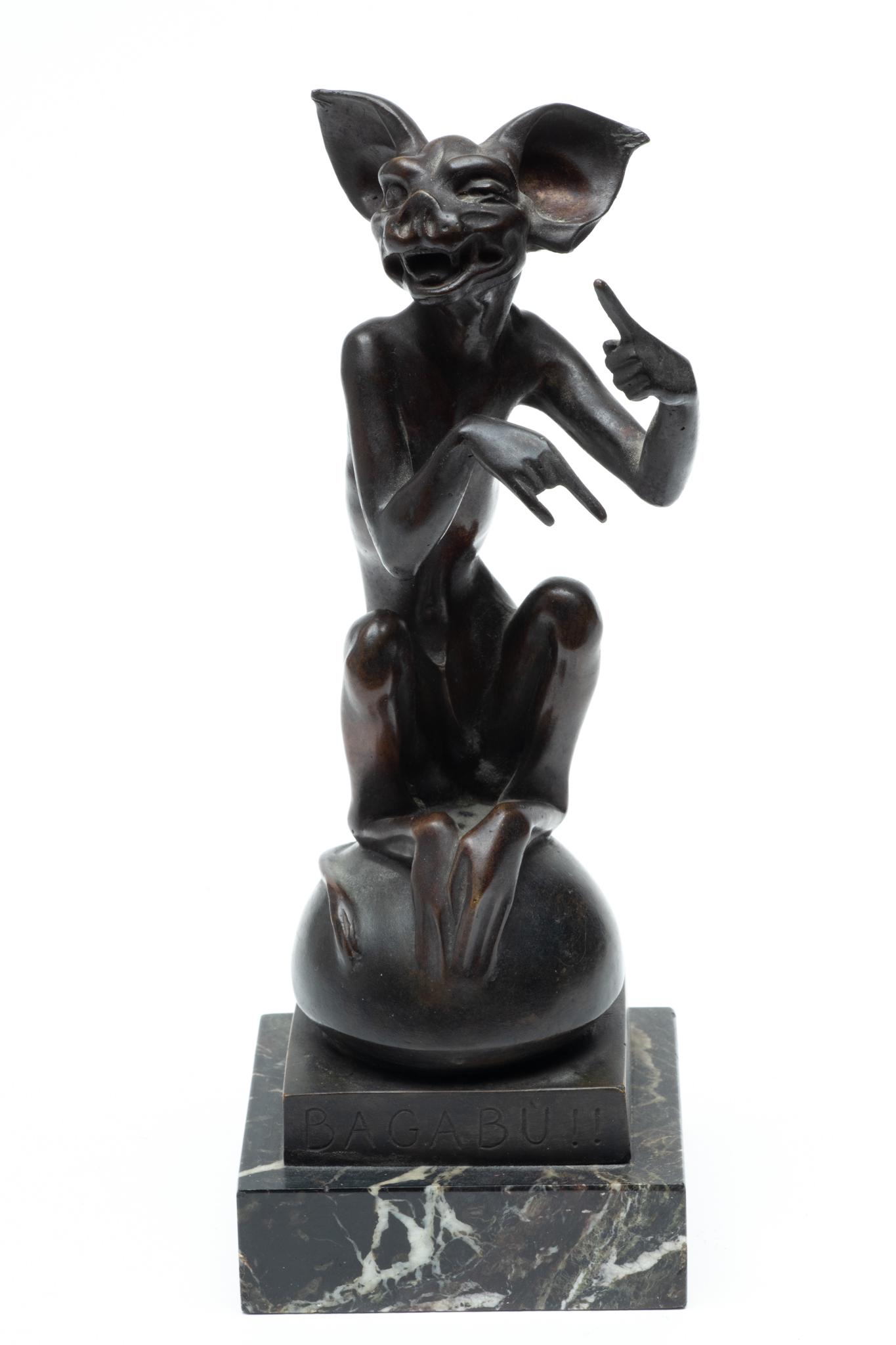 Fausta Vittoria Mengarini, 1893 -52 Table Top Bronze, Gargoyle On Dome. H 9.5" W 10": Fausta Vittoria Mengarini, 1893 -52 Table Top Bronze, Gargoyle On Dome. H 9.5" W 10" | Gargoyle sitting on plinth. Expressive hand gesture. Black and white veined marble. Provenance: From the Estate o