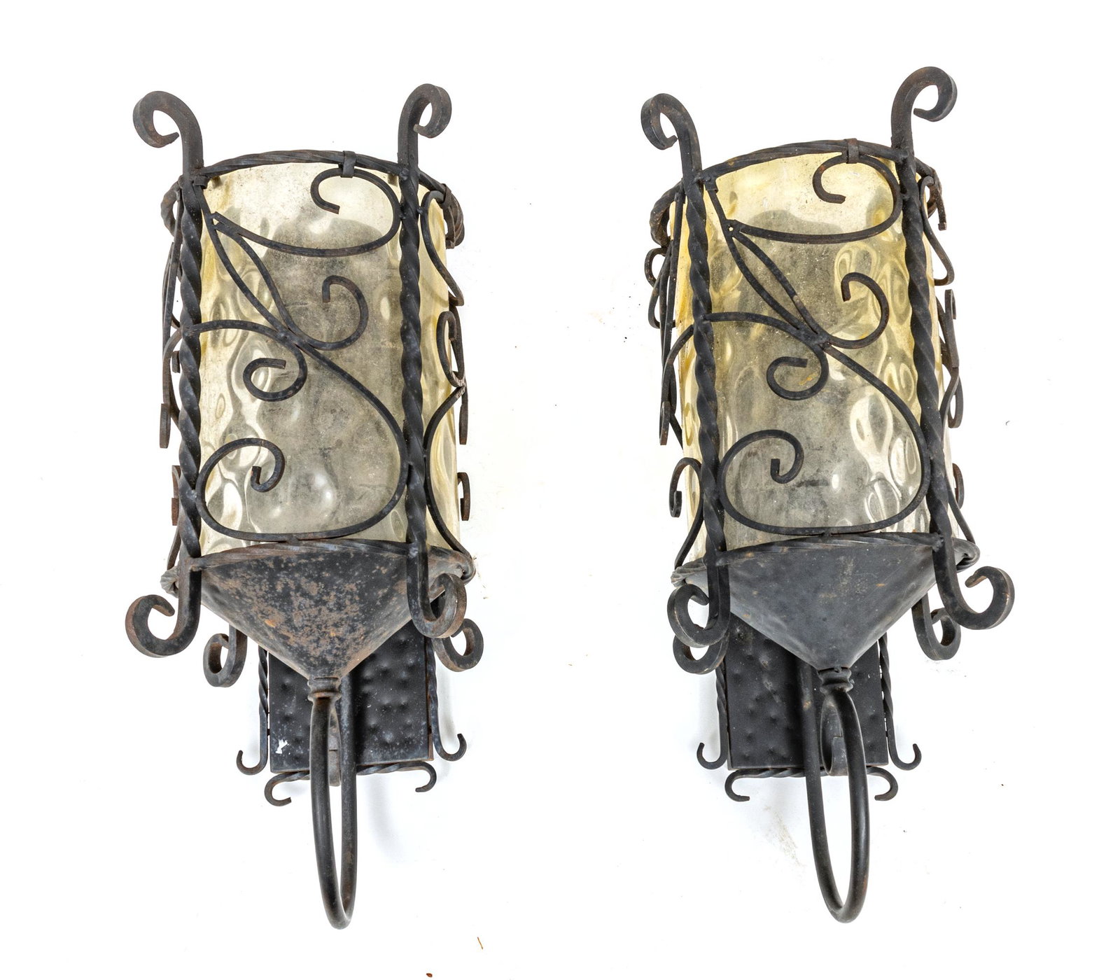Wrought Iron & Glass Outdoor Lanterns, H 24" W 9" Depth 13" 1 Pair: Wrought Iron & Glass Outdoor Lanterns, H 24" W 9" Depth 13" 1 Pair | The outdoor lanterns are electrified. With wrought iron swirls and twist forms surrounding the glass. Purchased at Kaminski's Aucti