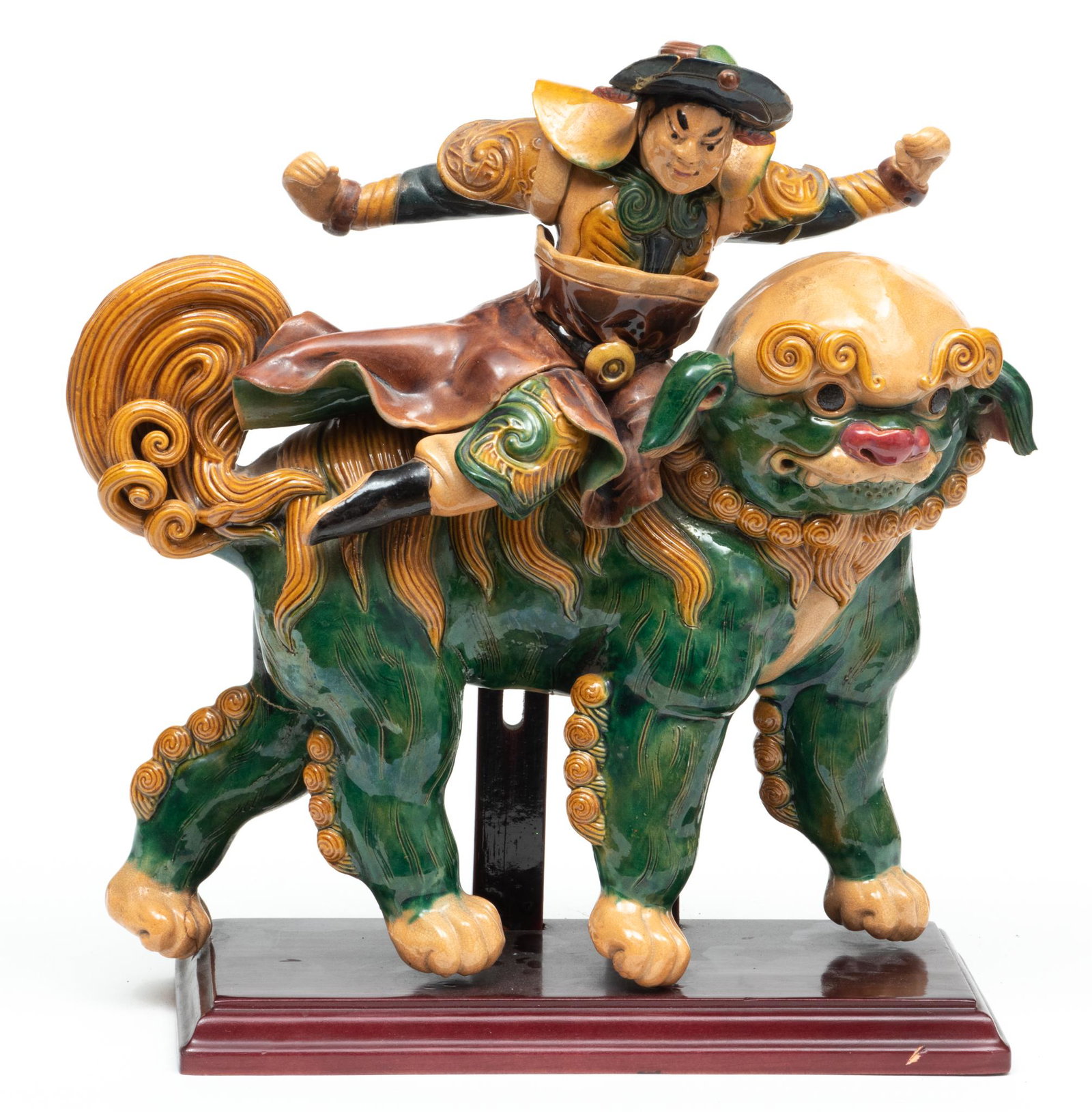 Chinese Glazed Ceramic Roof Tile, Male Figure Riding A Foo Lion, H 12" W 12": Chinese Glazed Ceramic Roof Tile, Male Figure Riding A Foo Lion, H 12" W 12" | Having a man riding a foo lion. Provenance: Property from a Bloomfield Township, MI private collection.