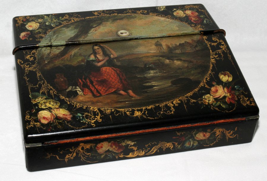 ENGLISH REGENCY PAPIER MACHE WRITING BOX,: ENGLISH REGENCY PAPIER MACHE WRITING BOX, C. 1820, W 12", D 9 3/4":A lovely antique box with nice detail. Painted scene in reserve at the cover and sides, opening to a red velvet writing surface, ink 