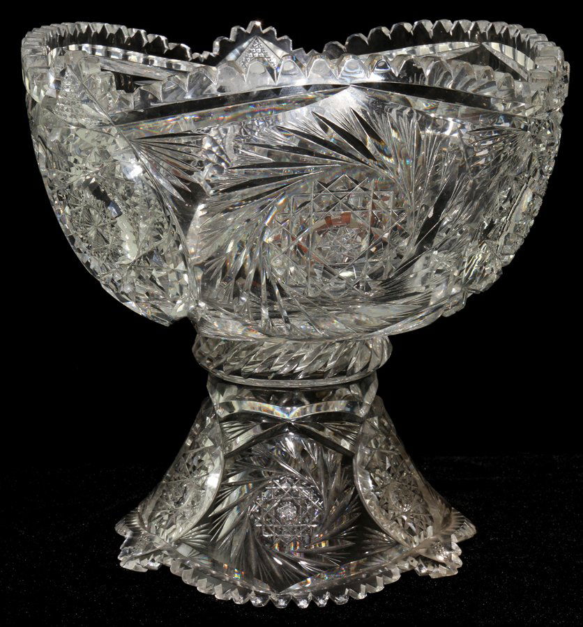 CUT GLASS PUNCH BOWL ON STAND, C. 1900,: CUT GLASS PUNCH BOWL ON STAND, C. 1900, H 9 1/2", DIA 10":Pinwheel and dahlia pattern. From the Estate of Julie Cudlip Whitman, Grosse Pointe Farms.