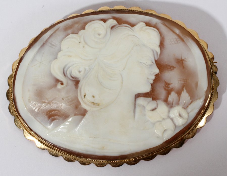 14KT GOLD & CARVED CAMEO BROOCH, W 2": 14KT GOLD & CARVED CAMEO BROOCH, W 2":An oval shell carved in cameo with an art nouveau style woman with roses.