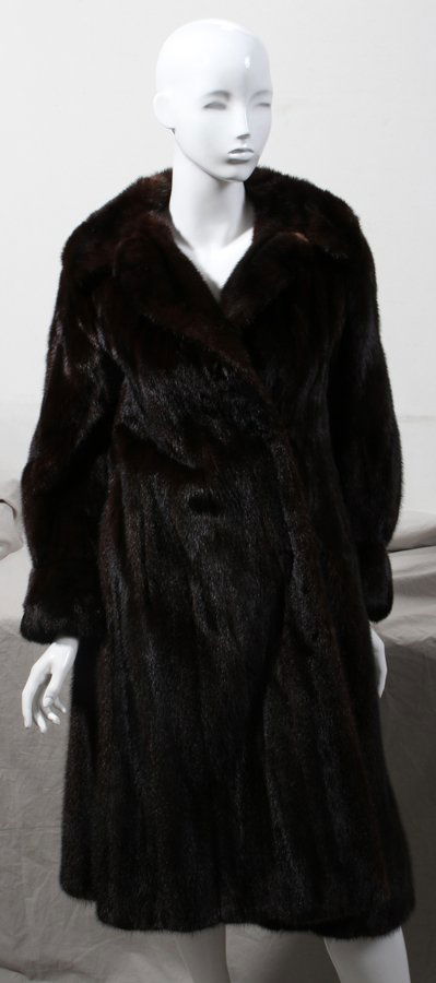 FURS BY BRICKER MINK COAT, 44": FURS BY BRICKER MINK COAT, 44" FROM SHOULDER TO HEM:With belt and stand-up collar. Two labels at the interior, one "Furs by Bricker Styles by Geo. Tunis Detroit, New York" and the other "Black Emerald