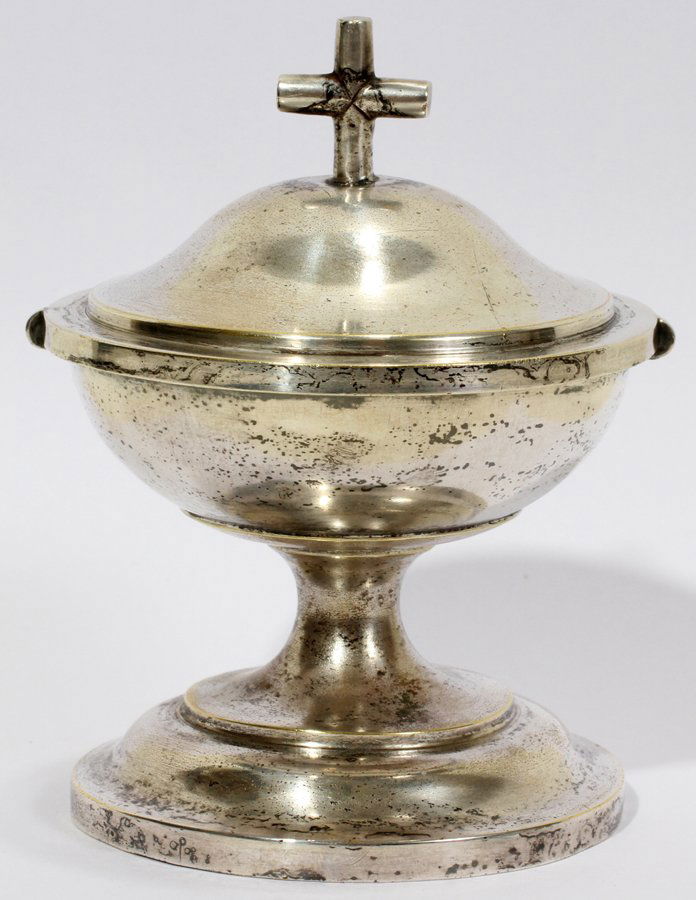 SILVERPLATE CIBORIUM, H 4": SILVERPLATE CIBORIUM, H 4":Simple form with cross finial, opening to gilt interior. No apparent marks.