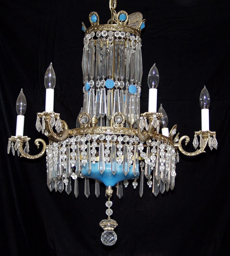 ART GLASS BLUE OPALINE AND CRYSTAL CHANDELIER: ART GLASS SIX-ARM, BLUE OPALINE AND CRYSTAL CHANDELIER, H 30'', DIA 24'':Bronze frame with crystal prisms and blue opaline accents.