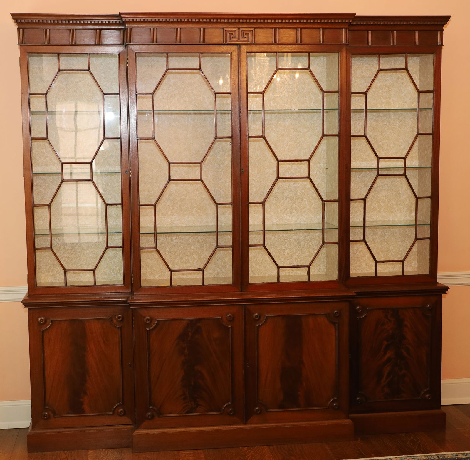 Georgian Style Flame Grain Mahogany Breakfront, c. 1960, H 91.5″ L 92.5″ D 19″ (1 of 5)