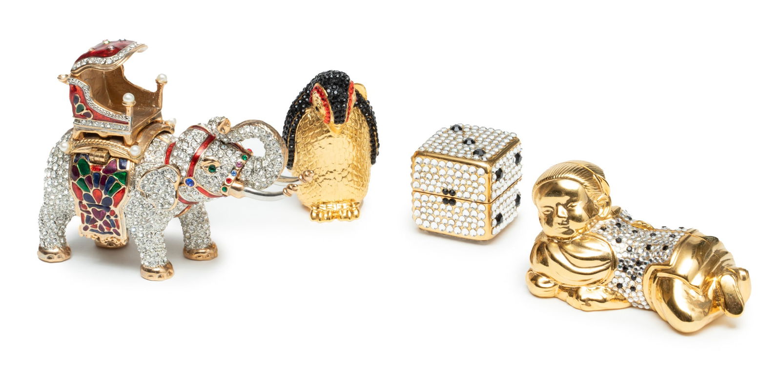 Judith Leiber (American) Pill Boxes, H 2.75" W 1" L 3.5" 4 pcs: Judith Leiber (American) Pill Boxes, H 2.75" W 1" L 3.5" 4 pcs | Including an elephant, reclining child, dice, and a penguin. The collection measures H 2.5-2.75", W 1-3".