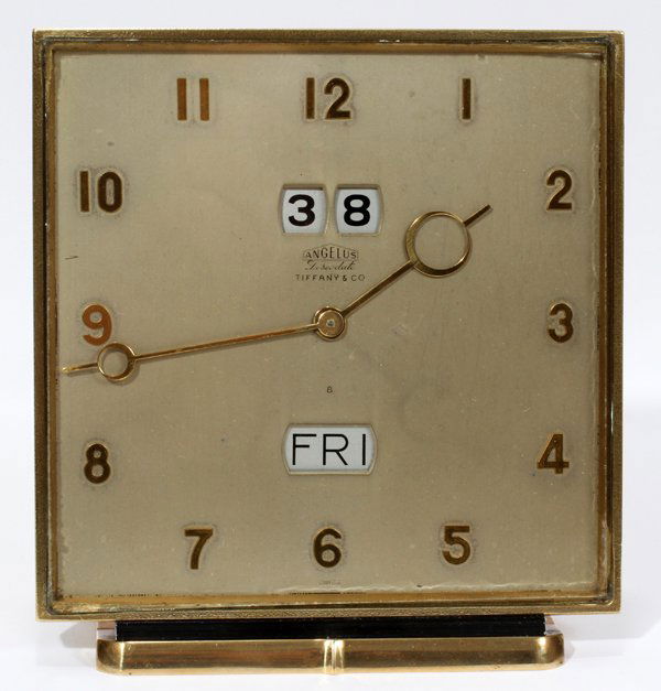 ANGELUS BRONZE CLOCK, RETAILED BY TIFFANY & CO.: ANGELUS 'DESCODATE' BRONZE CLOCK, RETAILED BY TIFFANY & CO., H 5 1/2", W 5":Desk clock is marked on the face with "Angelus Descodate Tiffany & Co. Swiss". Stamped at the underside "732".