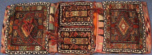 HAND WOVEN WOOL MIDDLE EASTERN CAMEL SADDLE BAG: HAND WOVEN WOOL MIDDLE EASTERN CAMEL SADDLE BAG, 45" X 16":Featuring three panels with an overall geometric designs.