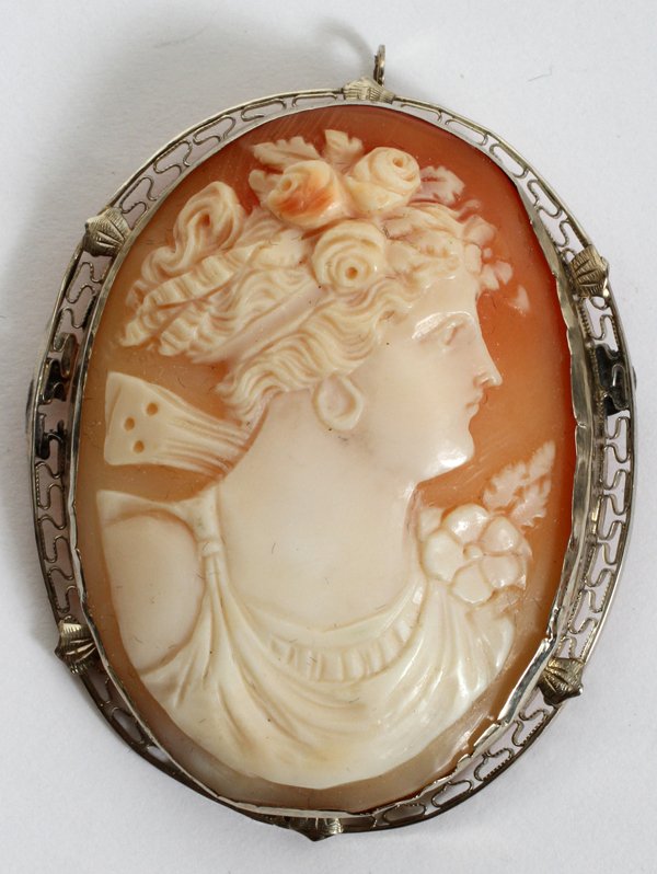 CARVED SHELL CAMEO BROOCH/PENDANT,: CARVED SHELL CAMEO BROOCH/PENDANT, H 2" X 2 1/2":Carved female with flowers in her hair.