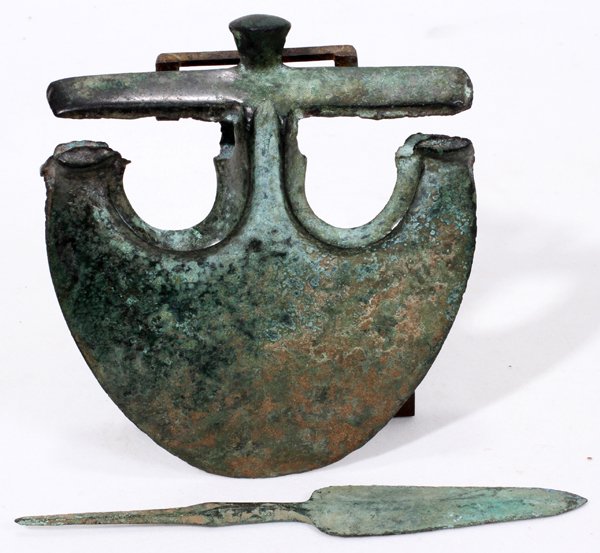 BRONZE AGE AXE HEAD & SPEAR HEAD, L 6 5/8": BRONZE AGE AXE HEAD, 5 1/2" X 5", & SPEAR HEAD, L 6 5/8":Including 1 fenestrated type axe head, alleged to be from Great Langdale, Cumberland, and 1 spear head. Two items total.