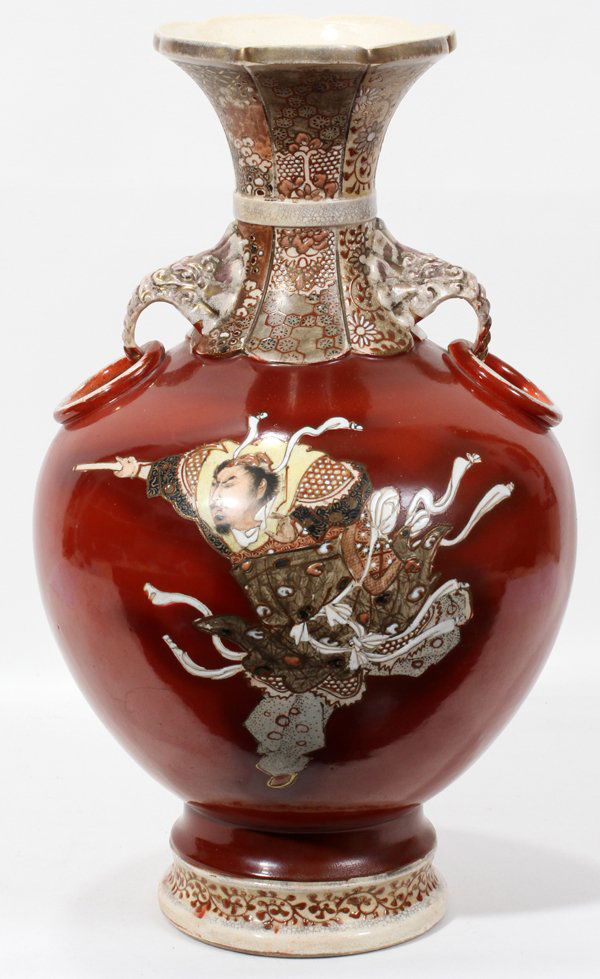 JAPANESE SATSUMA EARTHENWARE VASE, H 18", W 10": JAPANESE SATSUMA EARTHENWARE VASE, EARLY 20TH C., H 18", W 10":Hand-decorated with warrior figures on a chestnut colored ground, on a teakwood base.