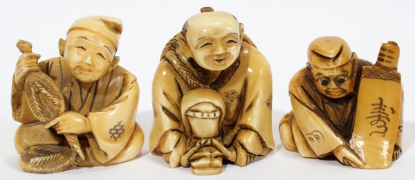 JAPANESE IVORY FIGURAL NETSUKE (3), SIGNED,: JAPANESE IVORY FIGURAL NETSUKE (3), SIGNED, H 1 1/2":Each is carved as a seated figure, one of which with extending eyes; all are signed at the underside.IVORY CANNOT BE SHIPPED OUTSIDE THE CONTINENTA