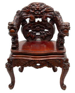 Japanese Hand Carved Rosewood Arm Chair, Lion with Dragon Motifs, Ca. 1900, H 36" W 28": Japanese Hand Carved Rosewood Arm Chair, Lion with Dragon Motifs, Ca. 1900, H 36" W 28" | the chair offers a lion and lotus flower motif to the backrest with dragon form armrest terminals. the skirt b